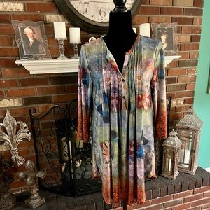 XL ladies tunic with pleating down the front.